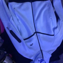 Light blue Nike tech