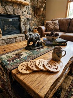 Set of Four wooden drink coasters featuring an intricate wolf portrait design