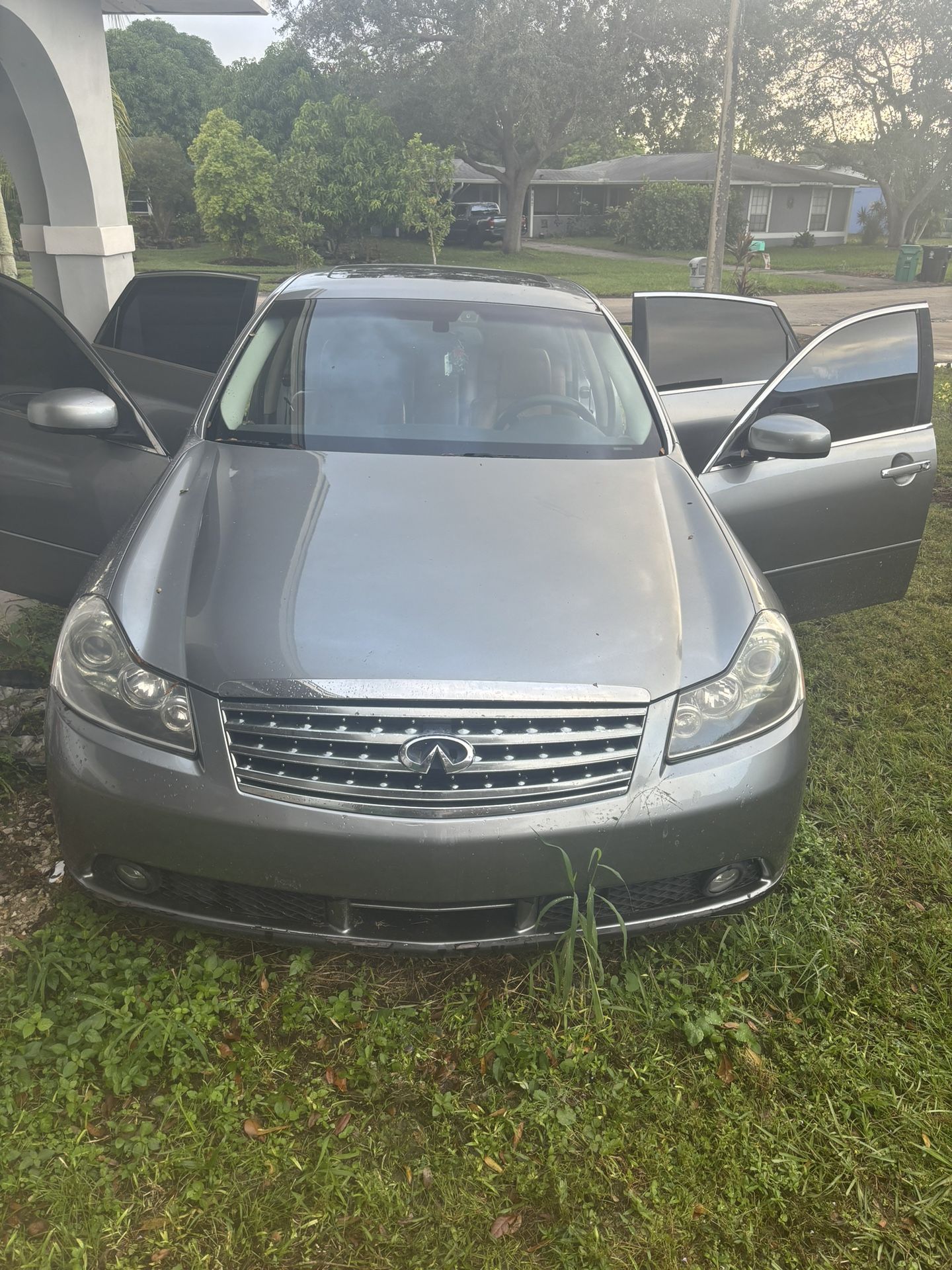 Infiniti M45 (PART OUT)Tail lights and 4 good rims