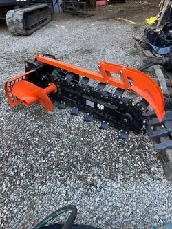 Mini skid steer trencher attachment