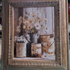 Beautiful hand-painted & distressed carved wood frame highlighting rusted buckets &  field daisies