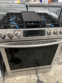 Samsung 30” slide in gas range in stainless steel new open box