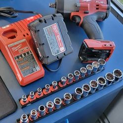 1/2 Milwaukee Impact Gun With Mac Tools Sockets