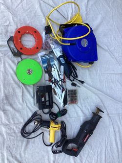 Lot - Corded Tools - Blades, Jig Saw, Reciprocating Saw, Heat Gun, Fish Tape, Measuring Tape, Extension Reel