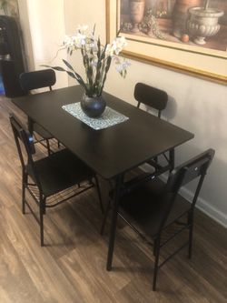 Like new black dining table set with 4 chairs