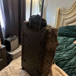 Louis Vuitton Rolling Duffle Luggage 
