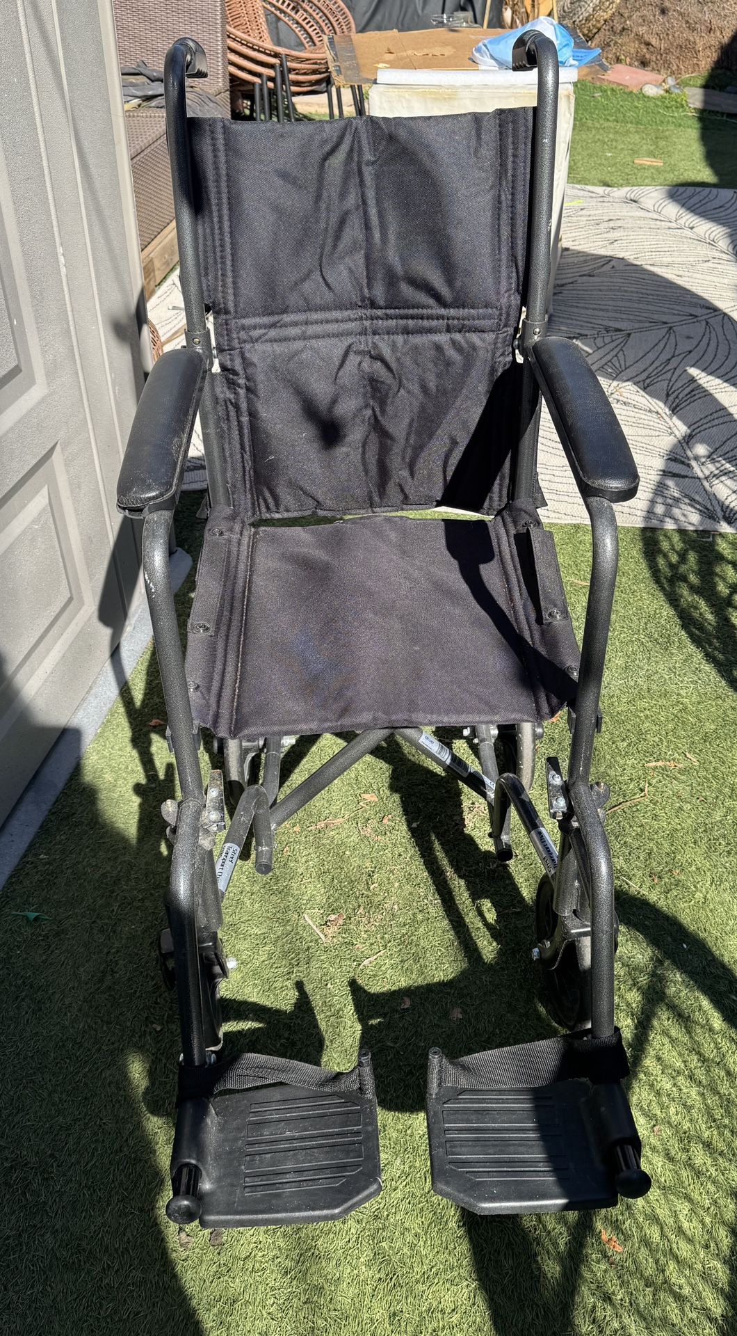 Transport wheelchair
