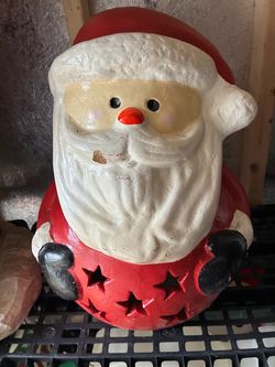 18” heavy Santa statue can put light in back ex cond