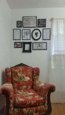 antique wingback with carved wood accents