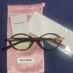 Miu Miu glasses 