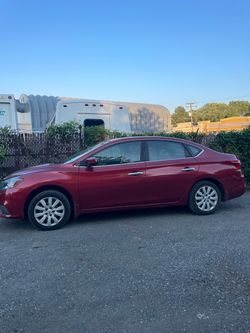 Nissan Sentra Red 4-Door Sedan