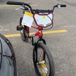 Mongoose Rebel RS1 Kids BMX Bike, 20-in wheel age 7-14 red