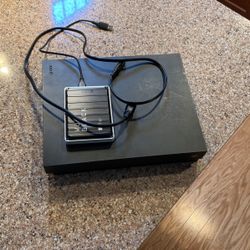 XBOX ONE X ENHANCED WITH 4TB Drive