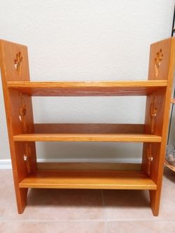 Bookshelf with 🌵 cutouts on sides