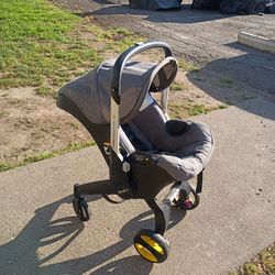Doonamaxx  STROLLER/CAR SEAT with base