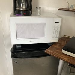 GE Stainless Steel Mini Fridge Clean And Works Great. Comes With A Stand If
