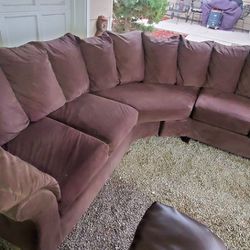 Dark brown Two-piece Couch Sectional. Delivery Available.Has Some Repairs Here N There But Sits Well