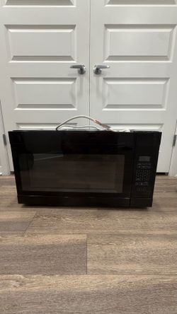 Amana Over-the-Range Microwave – Good Condition