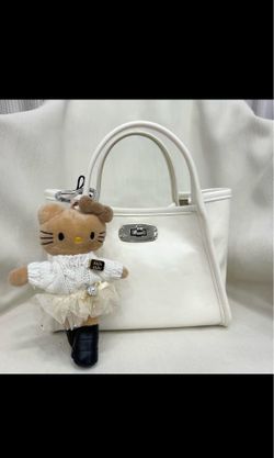 Brand new single crossbody bag / with Kitty bag hanging together
