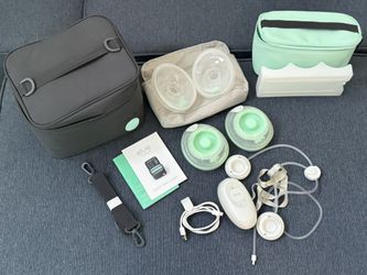 Complete Elvie double pump set β used only 3 times, like new! Hands-free, quiet and wearable!