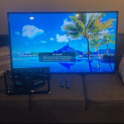 48” LG Smart TV  + Wall Mount & Firestick