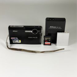 Nikon COOLPIX S7c Black 7.1 MP Digital Camera with 16GB Memory, Battery, Charger