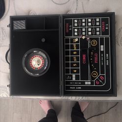 Vintage portable craps and roulette wheel