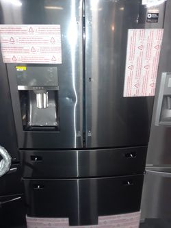 LG 4-door in door refrigerator. Brand new with manufacturers warranty