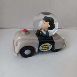 Hallmark Peanuts Gallery Snow Globe Lucy Driving the Common Sense Patrol Car 