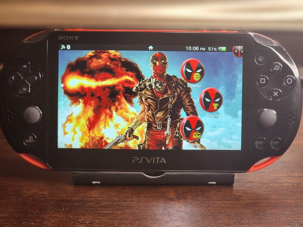 Red & Black PS Vita, 2000+ games with sd card & charger