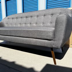 Brand New. Mid Century Modern Sofa. Retails Over $1400. Our Price $495