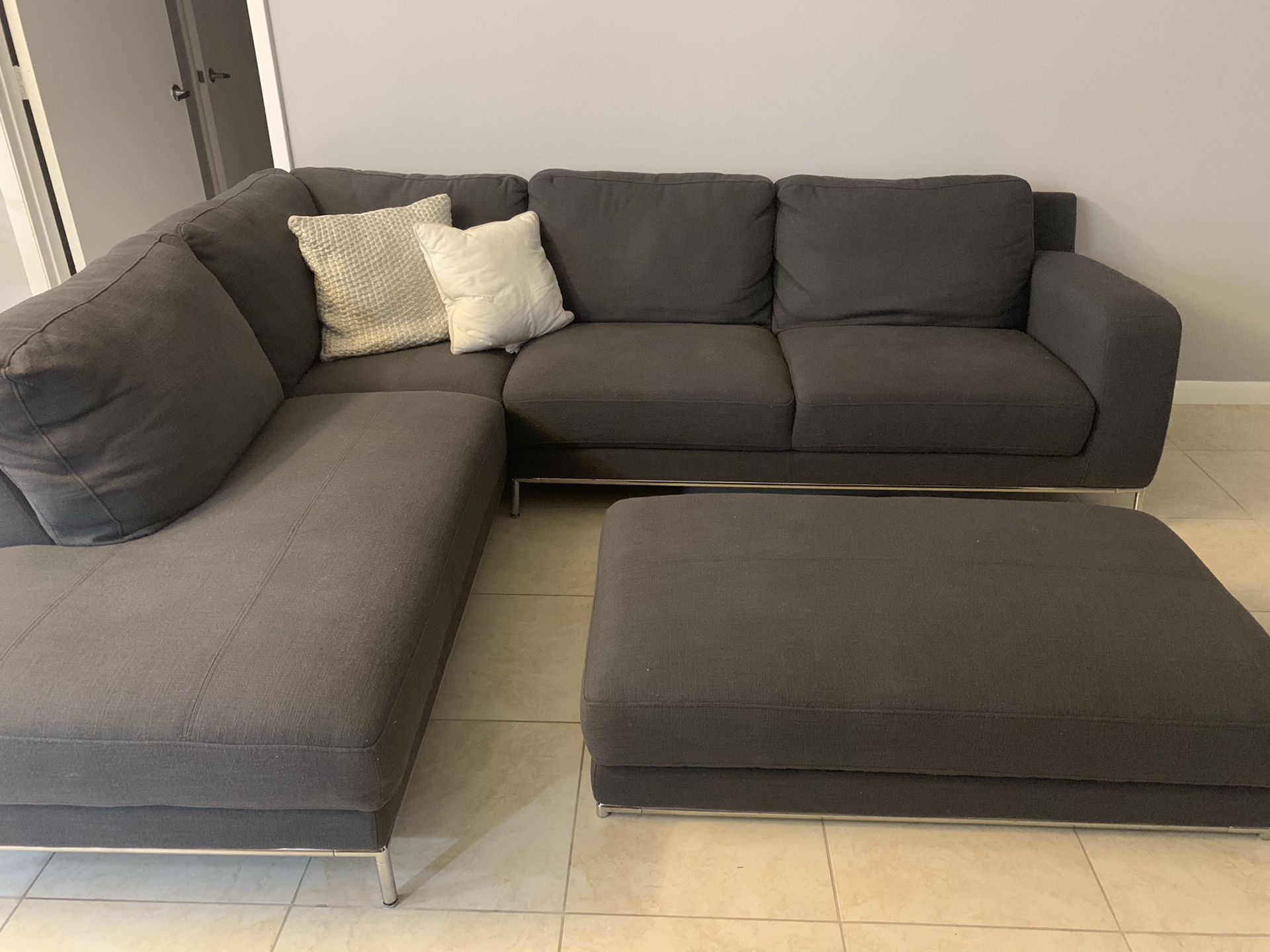 Gray Sectional with Ottoman