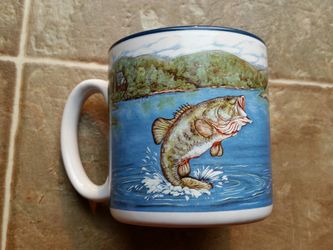 Mug with a picture of fish.