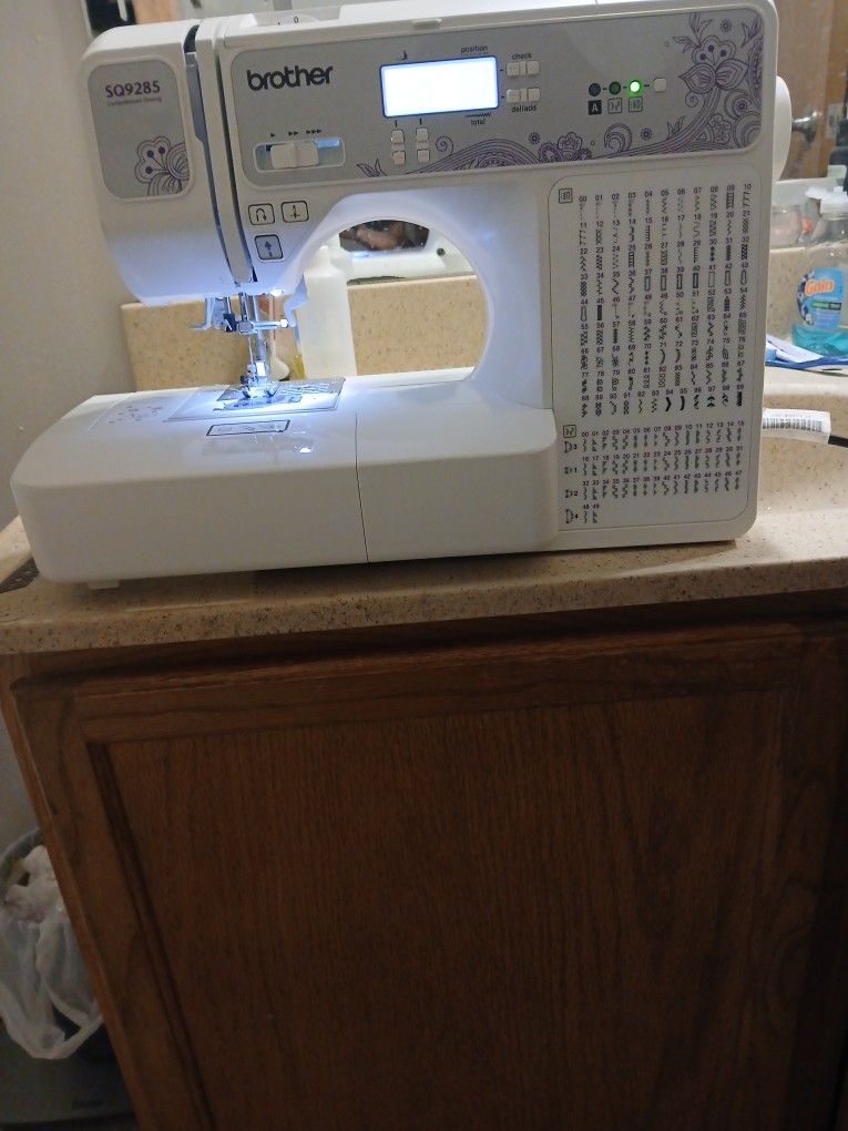 THE BROTHER SQ9285 COMPUTERIZED SEWING AND QUILTING MACHINE