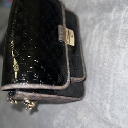 Michael Kors Women's Black Bradshaw Medium Logo Embossed Patent Leather Messenger Bag