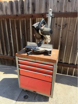 Mitre saw from Black and Decker with rolling Tool Box Chest of Drawers on wheels