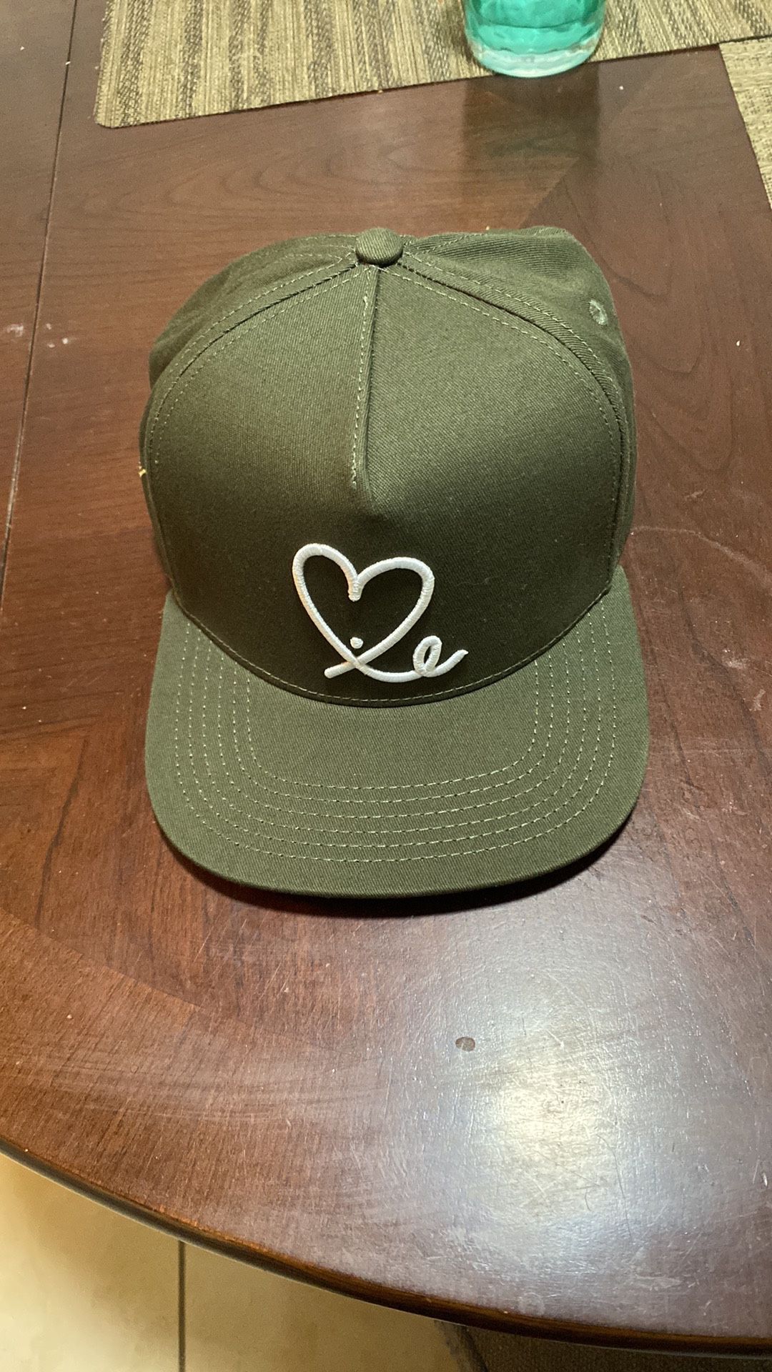 Stylish Green Cap With Heart Design