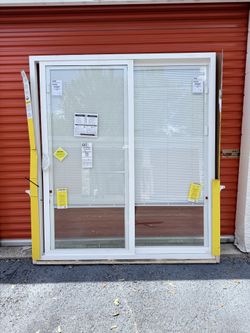 Pella 150 Series East 72-in x 80-in x 4-9/16-in Jamb White Vinyl Right-hand Sliding Patio Door with Low-E Gl...