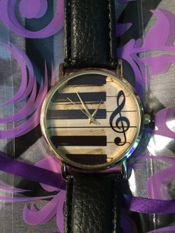 Watch with musical note