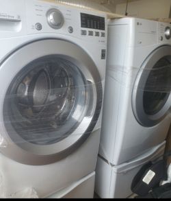 LG frontload washer/dryer set. w/stands and all hookups! Exceptional condition.  575 OBO. PICK UP as we don't have truck. Thank you!