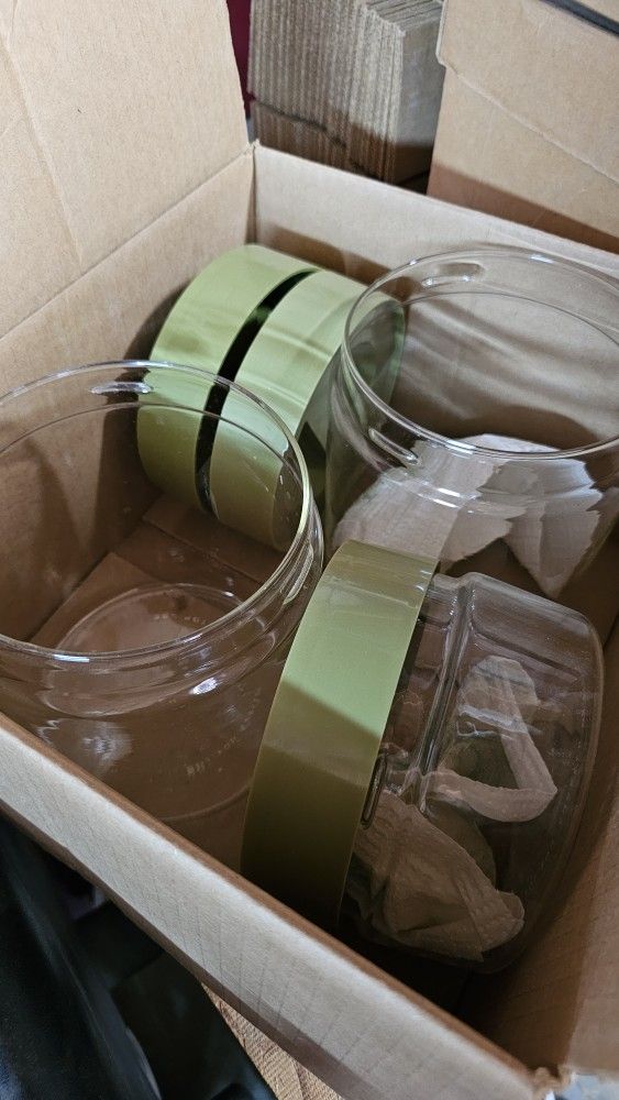 Set of 4 Vintage PYREX Glass Storage Jars β Olive Green Lids β Made in USA