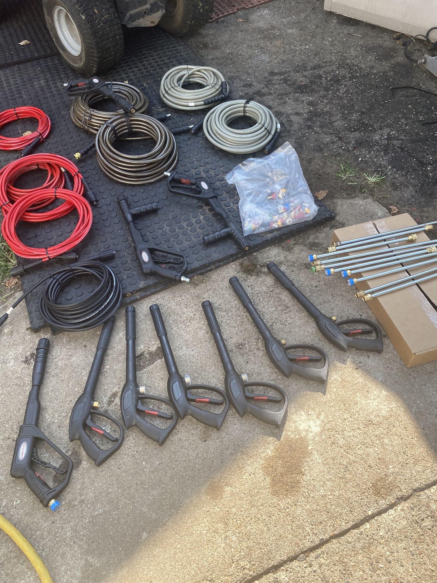 New Assorted Pressure Washer Hoses And Wands And Extensions And Bag Of Pressure Tips
