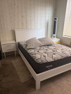 Sealy Revive Mattress with White Bed Frame