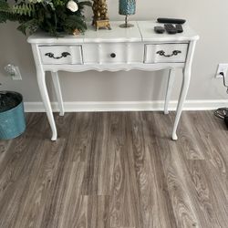 Antique vanity table with mirror