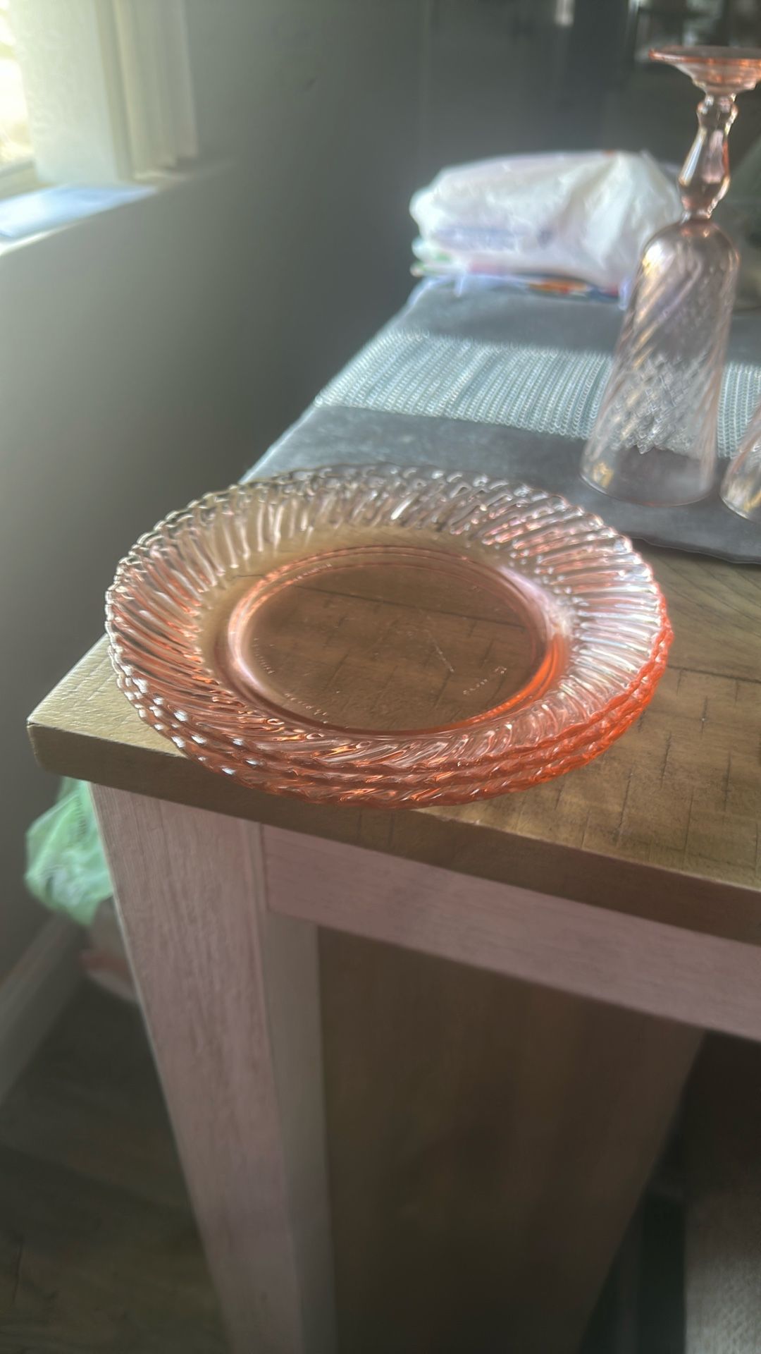 Vintage Pink glass Plates were produced by France