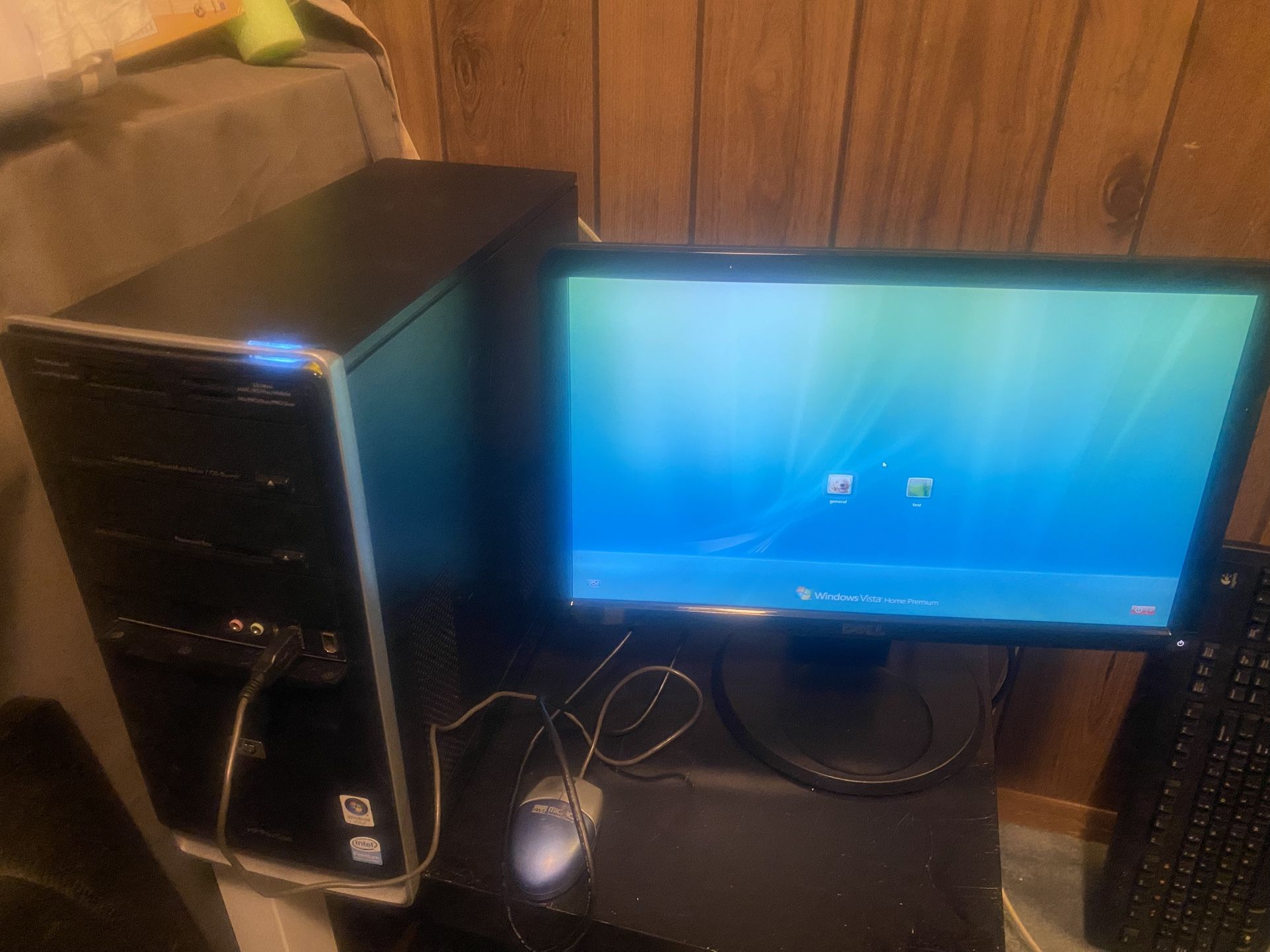 A computer with two monitors and a keypad, all for twenty dollars