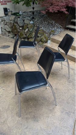 MCM chrome black faux leather chairs