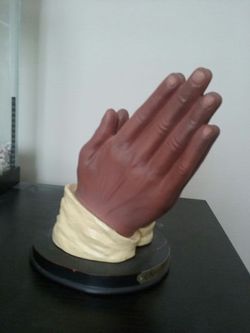 Ebony Treasures praying hands statue