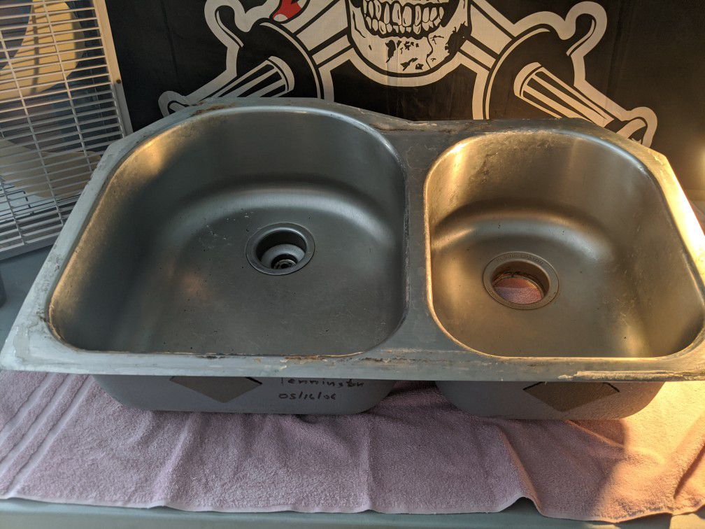 Contemporary stainless steel two tub kitchen sink. 10"x36"