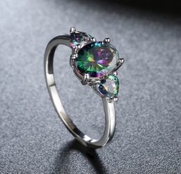 Sterling silver ring dipped in 18k white gold, with genuine rainbow mystic Topaz stones